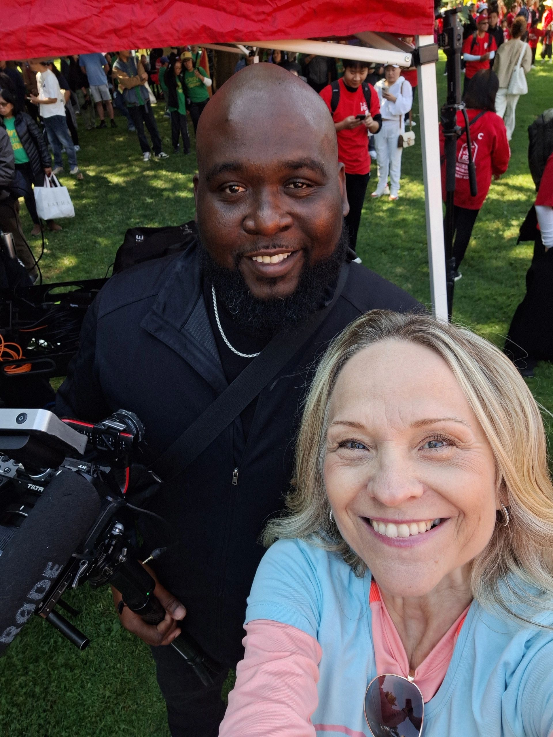 Joanne with Poetic Stone Studios photographer at Jesus in the City Parade 2025