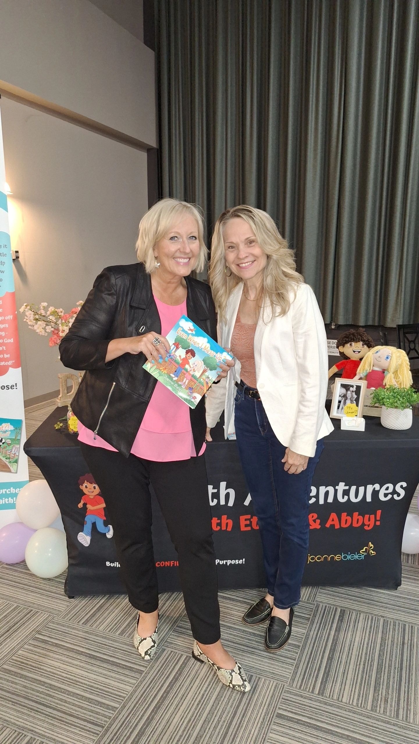 Joanne with Cheryl Weber at the Faith Adventures book table at 100 Huntley Street Crossroads CCI